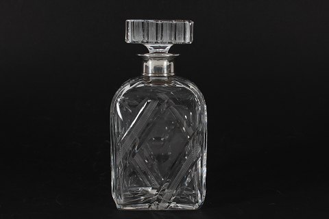 Whisky decanter
Old decanter
with silver neck
