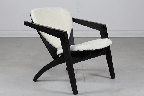 Hans J. Wegner
Butterfly Easy Chair GE 460
Black oak + sheepskin